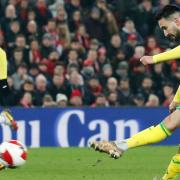Lukas Rupp scored late on for Norwich City in a 2-1 FA Cup defeat at Liverpool