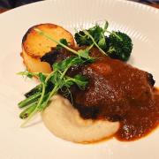 Braised feather blade of beef with fondant potato, Jerusalem artichoke purée, tenderstem broccoli and pearl onion jus from Prelude at Norwich Theatre Royal.