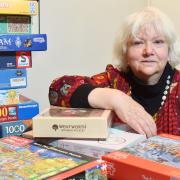Gail Durbin with just a handful of the hundreds of jigsaws already collected to raise money for NR2 Community Skills Share