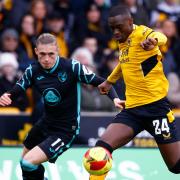 Przemyslaw Placheta closes down Wolves defender Toti Gomes during City's FA Cup win at Molineux