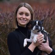 Oa Hackett at the Little Lifts HQ in Norwich with her dog Norma.
Byline: Sonya Duncan