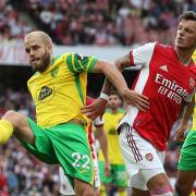 Teemu Pukki and Ben White of Arsenal in action during Norwich City's 1-0 loss in London in September