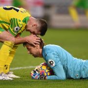 Norwich City midfielder Kenny McLean shares his relief with keeper Tim Krul towards the end of last month's win at Brentford