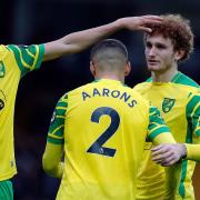 Pierre Lees-Melou and Max Aarons console Josh Sargent after Norwich City's goalless draw with Brighton at Carrow Road