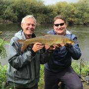 Joe and John Bailey with a cracking Wye barbel