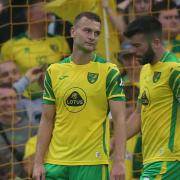 The Norwich players look dejected after conceding their side's second goal during the Premier League match at Carrow Road