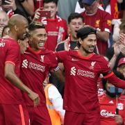 Liverpool's Roberto Firmino (third from left) celebrates scoring his side's second goal during the pre-season friendly against Osasuna at Anfield