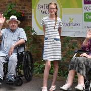 Ruby Jennings is a junior ambassador for charity Friend in Deed pictured with care home residents Maurice Hovells and Audrey Adcock from badgers Wood Care Home. Byline: Sonya Duncan