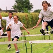 Year 7 girls hurdles race at Acle high school sports day in 1999.
