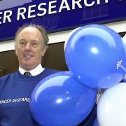 Dr Ian Gibson opening a new Cancer Research UK shop on London Street in Norwich in 2002