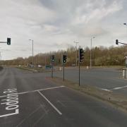 The traffic lights at the bottom of the A47 sip road onto the A146 near where two cars crashed on December 8, 2020.