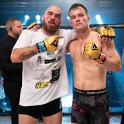 Scott Butters, left, and Richard Mearns after their fight at Contenders 27. Mearns won by armbar submission in the second round. Picture: BRETT KING