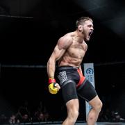 Craig Edwards celebrates his victory in the Battle of Anglia main event at Cage Warriors Academy South East 23 in Colchester. Picture: BRETT KING