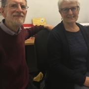 Chatterbox volunteer Frances Pearce with chairman David Potten. Volunteers are recording a podcast from their own homes to ensure visually impaired people can still listen to news. Picture: Bethany Wales