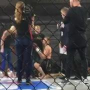 Damantas Matulevicius goes down on one knee to propose to his girlfriend in the cage at Contenders 20. Picture: MARK HEATH