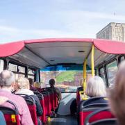 Guests on the open top bus tour approach Norwich Castle. Picture: Richard Jarmy Photography
