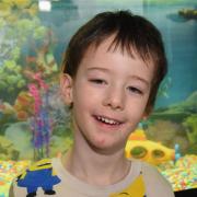 Finley Archer-Dawson with his fish tank that was donated by Darius Lapinskas from the Norfolk African Sichlids Fish and Tanks group