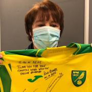 Norwich City Football Club gifted a signed shirt to vaccination staff at Norwich Community Hospital to thank them for their hard work