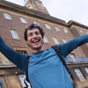 Lee Skoyles, 29, celebrates as he arrives at the City Hall after completing his walk from Land's End to Norwich in 19 days for Headway Norfolk and Waveney. Picture: DENISE BRADLEY