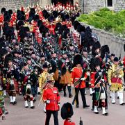 Musicians from the Scottish and Irish Regiments, the Brigade of Gurkhas, the Royal Air Force and The Band of the Grenadier Guards arriving for the Committal Service of Queen Elizabeth II at St George's Chapel, Windsor Castle, on September 19