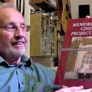 David Tate with a copy of his book about life as a Great Yarmouth projectionist
