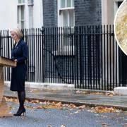 Prime Minister, Liz Truss makes a statement outside 10 Downing Street, London, where she announced her resignation as Prime Minister on Thursday October 20, 2022. Inset: A sea trout jumps up a wear wall at Hexham in Northumberland on their migration up