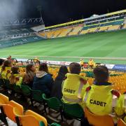Police cadets watch on as emergency services practice for the event of a fire at Carrow Road - Picture: Norfolk police