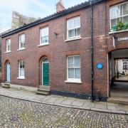 This over-the-passage terrace on historic Elm Hill has come up for sale
