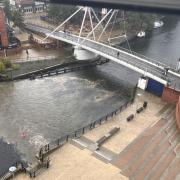 Drainage water was flowing through the River Wensum after an overflow system was released during heavy rainfall in the city