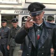 A group of men dressed in SS uniform outside of The Lobster pub in Sheringham Image: Submitted
