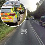 The A140 was blocked after a two-vehicle crash