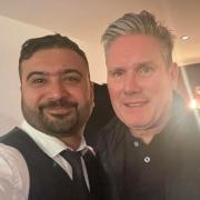 Keir Starmer and Merchants of Spice owner Nish after he enjoyed a curry at the city restaurant