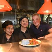 Andy Davis, owner, with his team at Thai Issan in Norwich's Yalm Food Hall Picture: Sonya Duncan