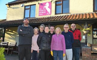 Staff and volunteers outside the White Horse pub in Upton ahead of its relaunch on January 13. Image: Sonya Duncan